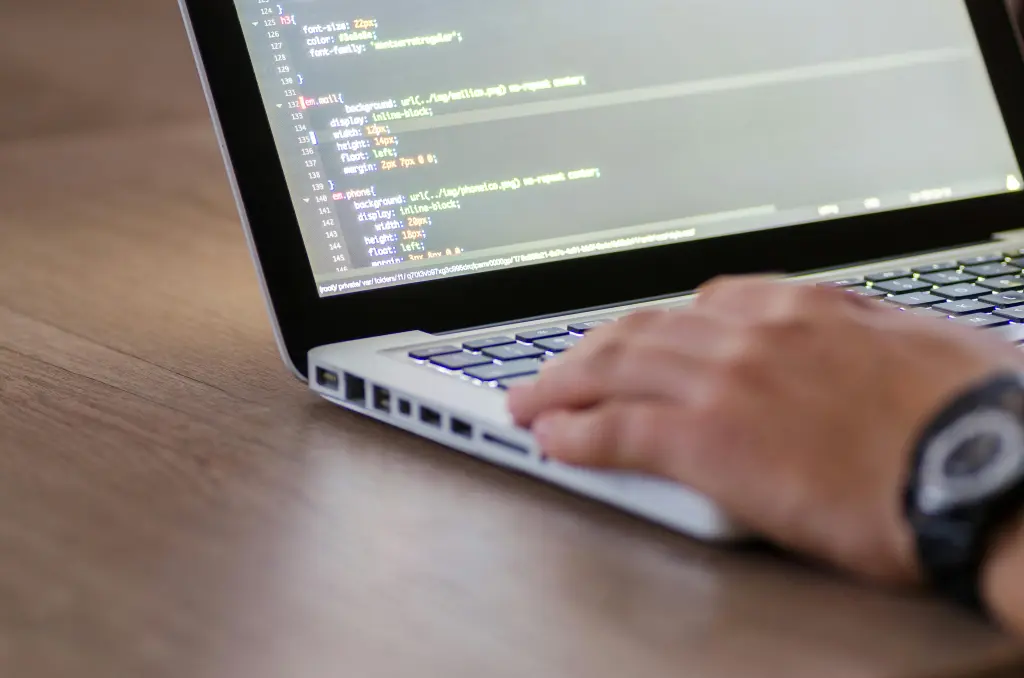 Person using macbook pro